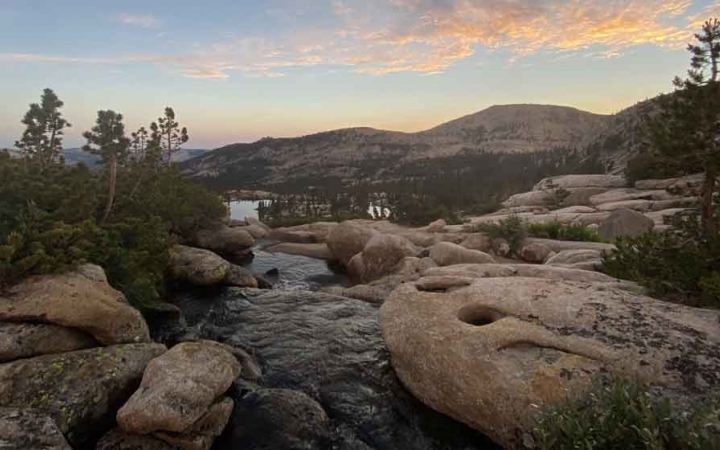 a creek flows through rocks in the sierra nevada range